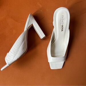 White snakeskin heels